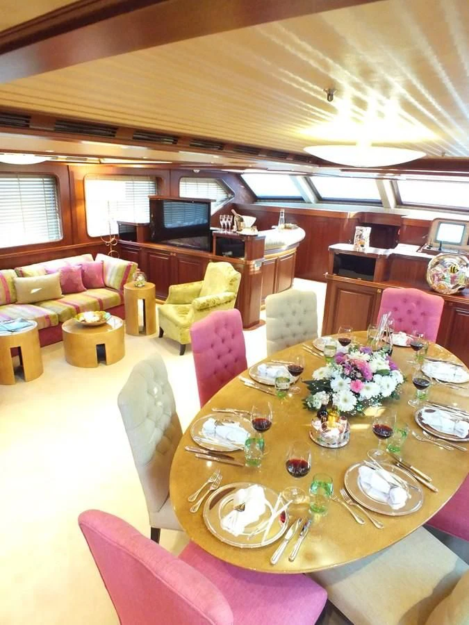 a dining room with a table set aboard CLEAR EYES Yacht for Sale