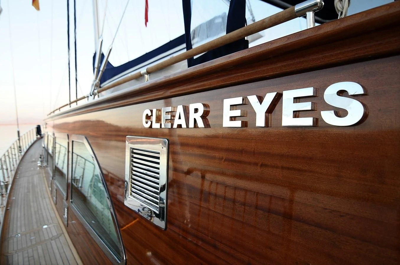 a wooden building with a railing aboard CLEAR EYES Yacht for Sale