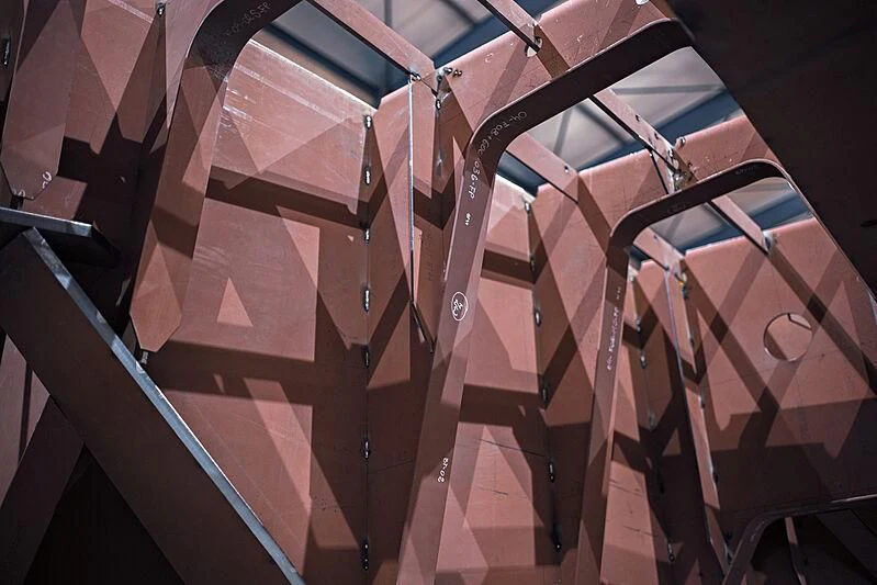 a stack of red bars aboard IRIS BLUE Yacht for Sale
