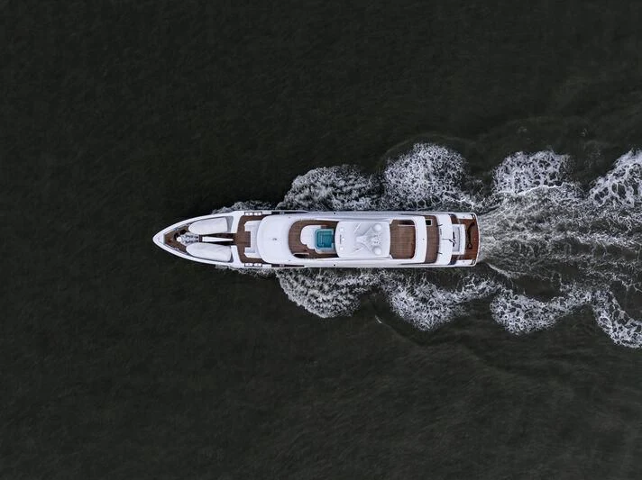 a logo in the water aboard IRIS BLUE Yacht for Sale