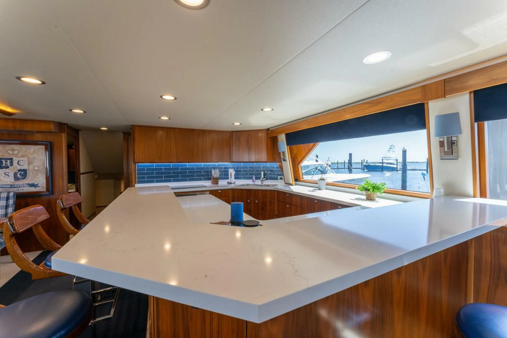 a large kitchen with a large island aboard HIGH COTTON Yacht for Sale