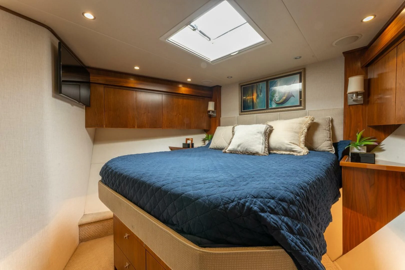 a bed in a room aboard HIGH COTTON Yacht for Sale