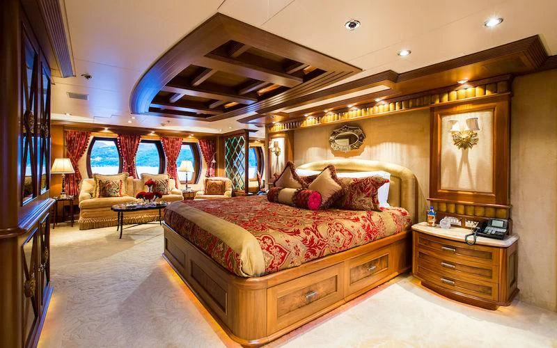 a large bed in a room aboard HARMONY Yacht for Sale