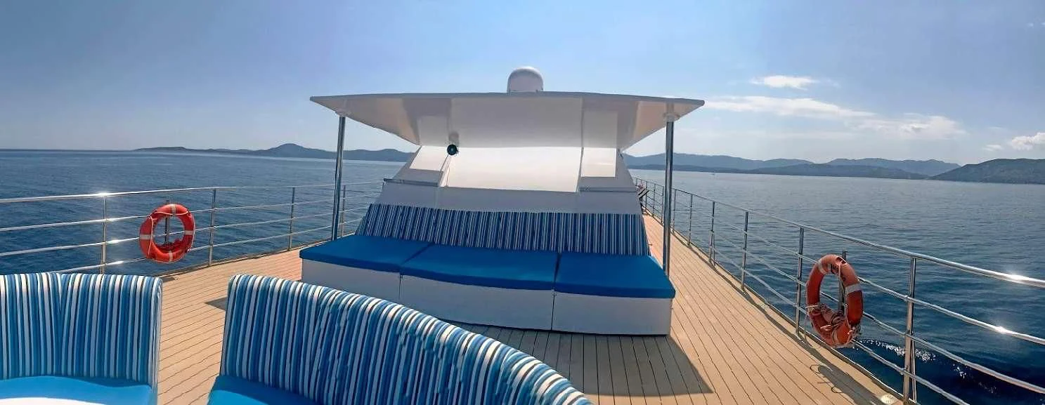 a person on a boat aboard HARMONY Yacht for Sale