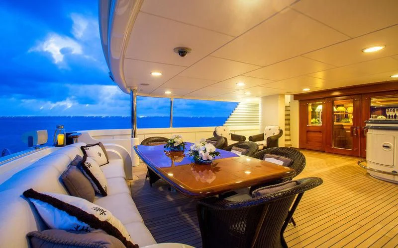 a large living room with a large pool aboard HARMONY Yacht for Sale