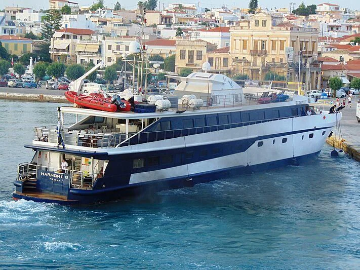 a large boat on the water aboard HARMONY Yacht for Sale