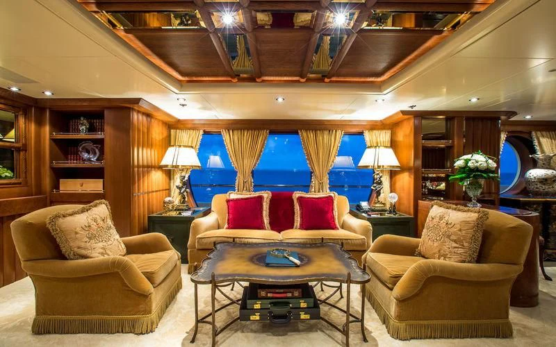 a living room with a large window aboard HARMONY Yacht for Sale