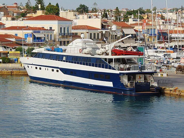 a large boat in the water aboard HARMONY Yacht for Sale