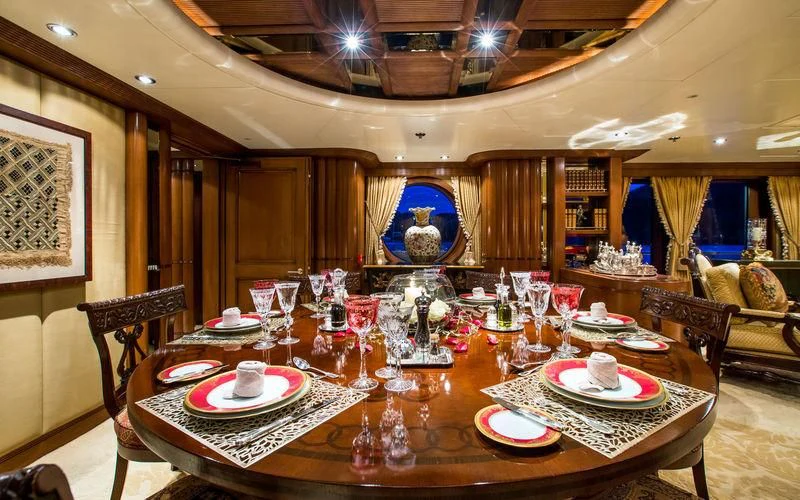 a large dining room table aboard HARMONY Yacht for Sale