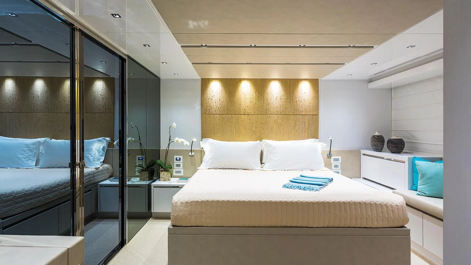 a room with two beds aboard SEASUN Yacht for Sale