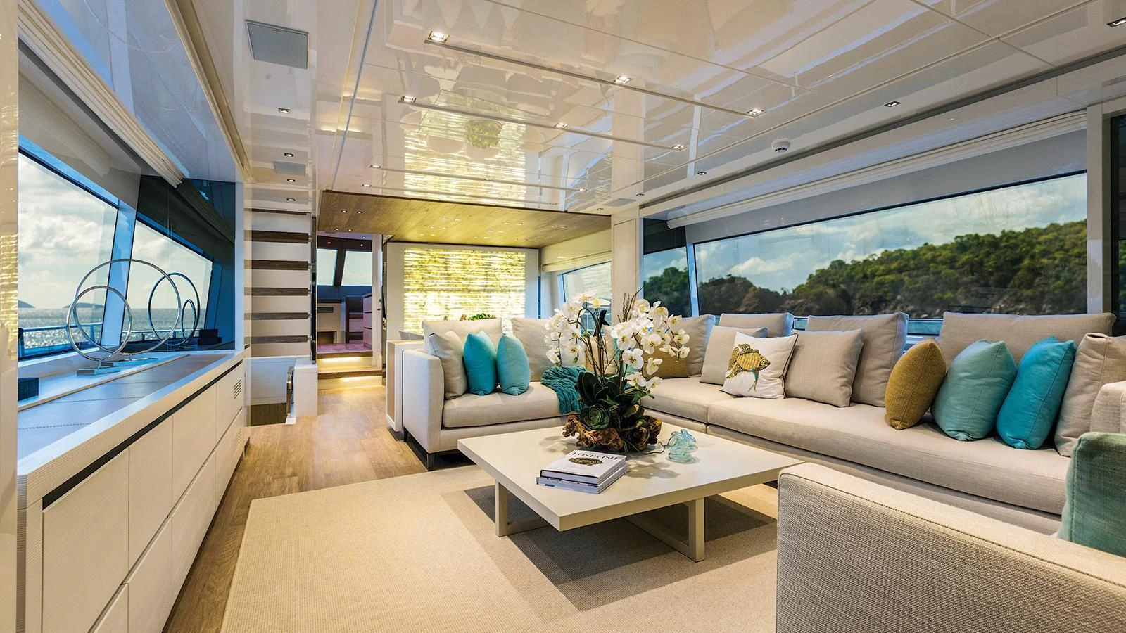 a living room with a large window aboard SEASUN Yacht for Sale