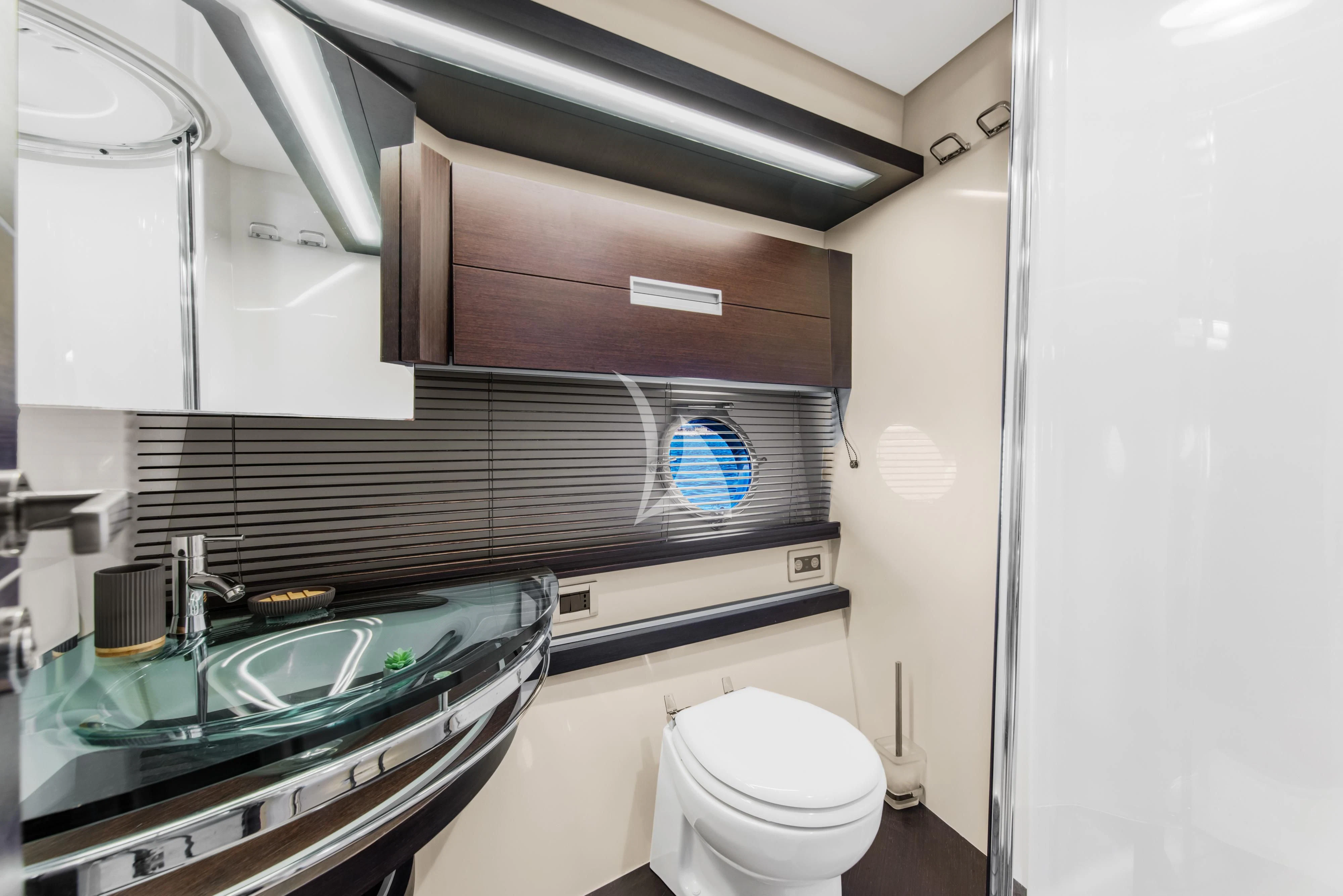 a bathroom with a sink and a toilet aboard FALCH Yacht for Charter