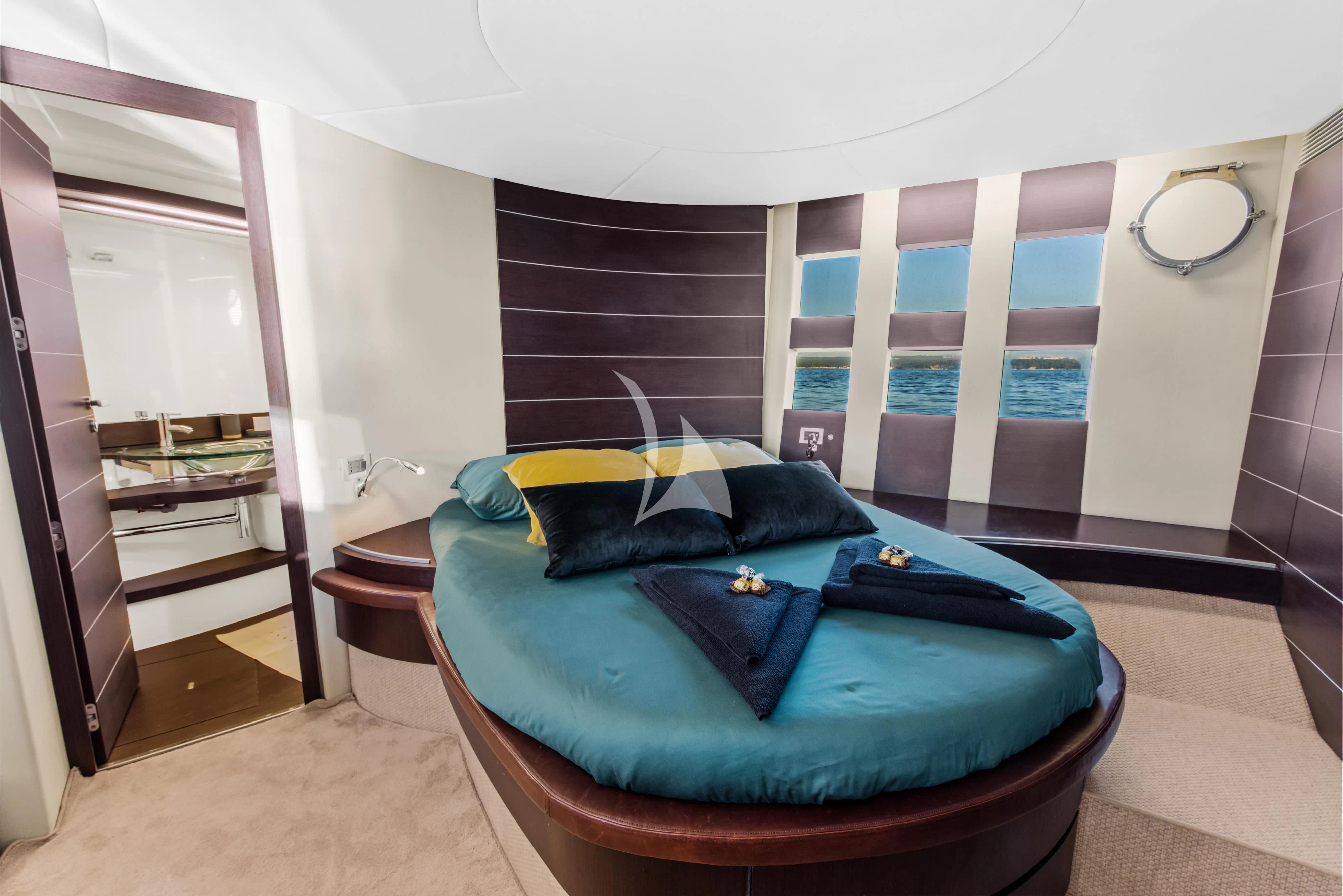 a bed in a room aboard FALCH Yacht for Charter