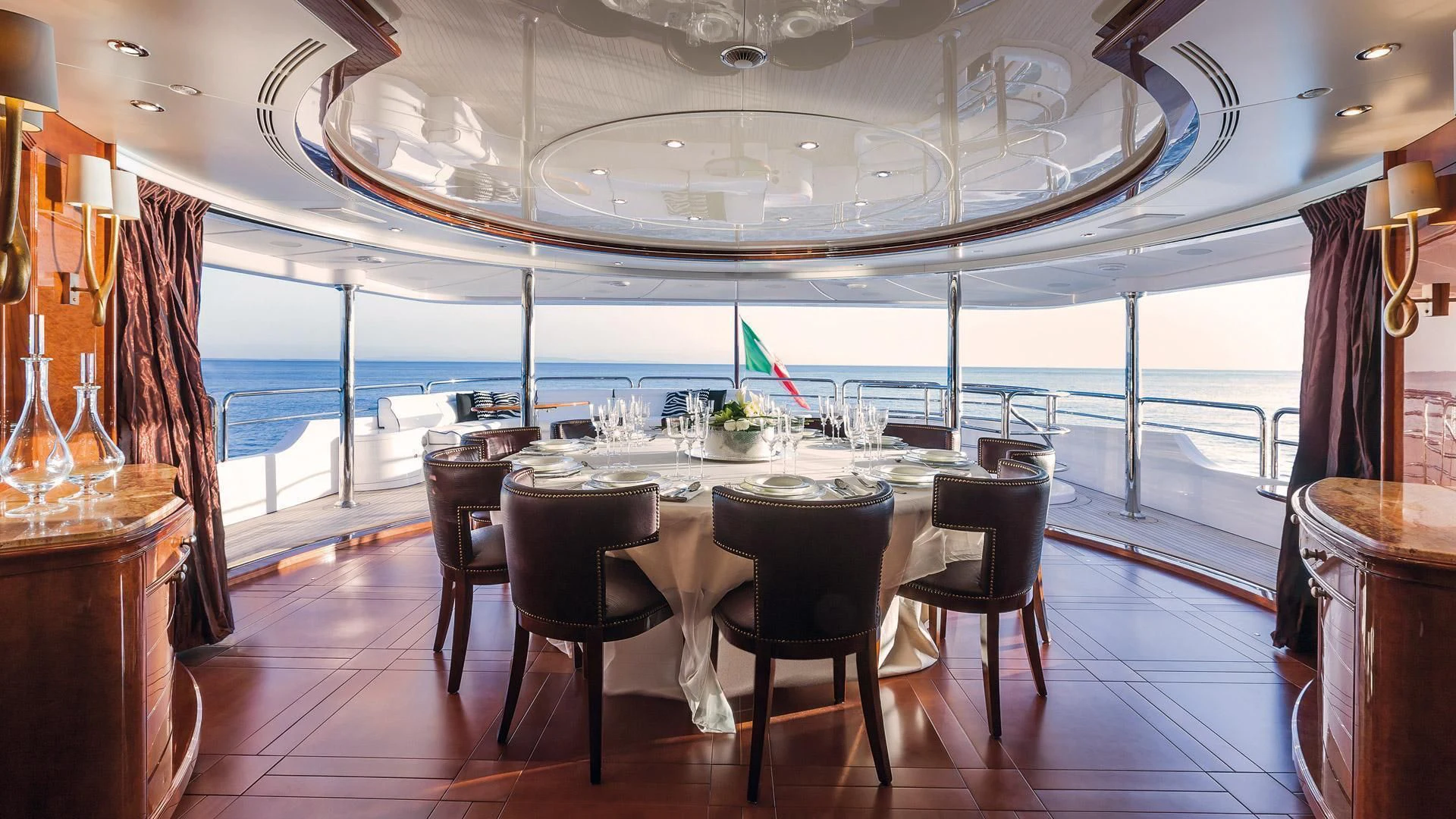 a room with a table and chairs aboard CHECKMATE Yacht for Charter