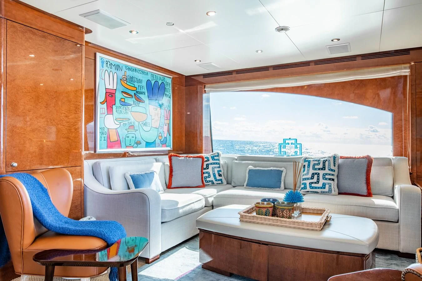 a living room with a large window aboard CHECKMATE Yacht for Charter