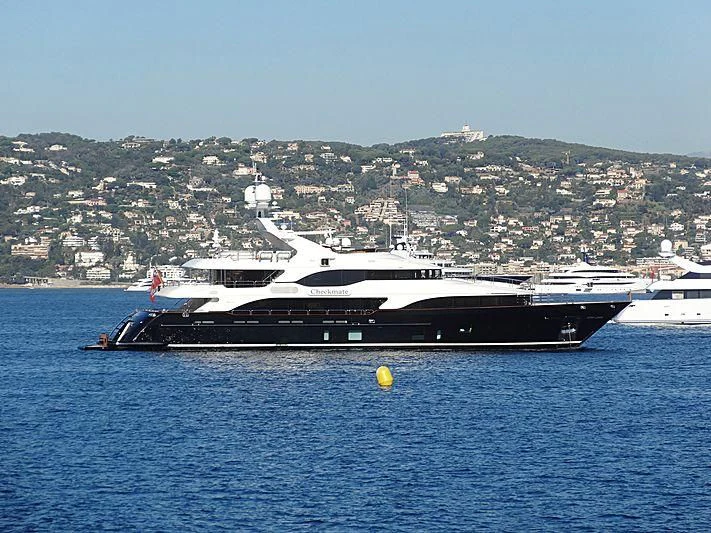 a large ship in the water aboard CHECKMATE Yacht for Charter