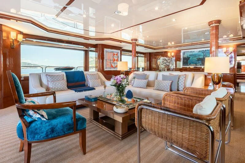 a living room with a large window aboard CHECKMATE Yacht for Charter