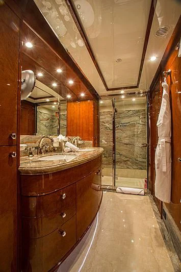 a bathroom with a large mirror aboard CHECKMATE Yacht for Charter