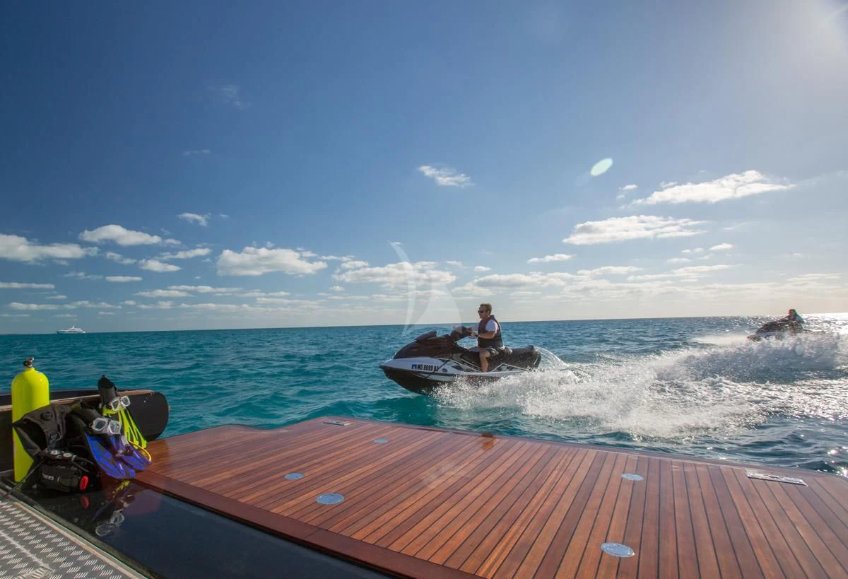 a person riding a jet ski aboard CHECKMATE Yacht for Charter
