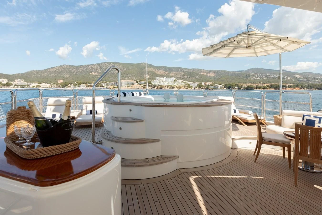 a white boat on a deck aboard CHECKMATE Yacht for Charter