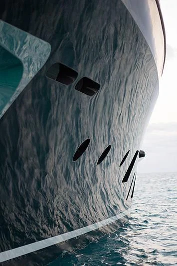 a boat with a large sail aboard CHECKMATE Yacht for Charter