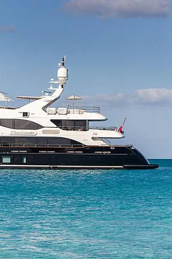a large white boat in the water aboard CHECKMATE Yacht for Charter