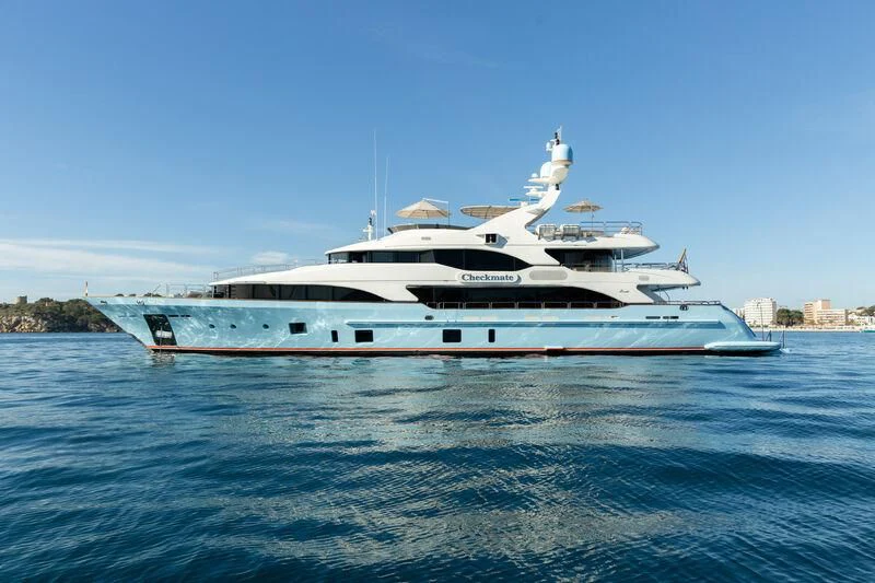 a white yacht in the water aboard CHECKMATE Yacht for Charter