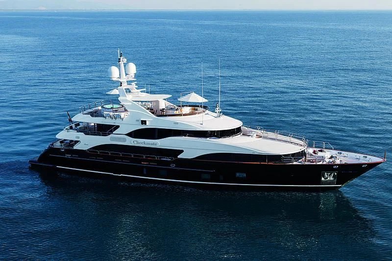 a large white boat in the water aboard CHECKMATE Yacht for Charter