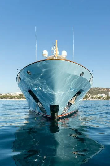 a large blue and white boat in the water aboard CHECKMATE Yacht for Charter