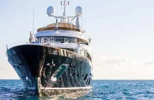a large ship on the water aboard CHECKMATE Yacht for Charter