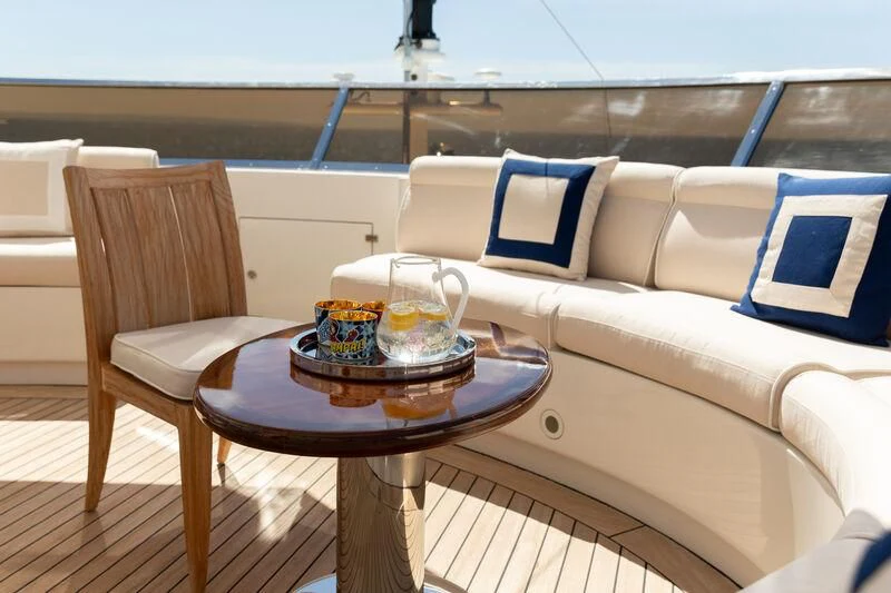 a coffee table on a deck aboard CHECKMATE Yacht for Charter