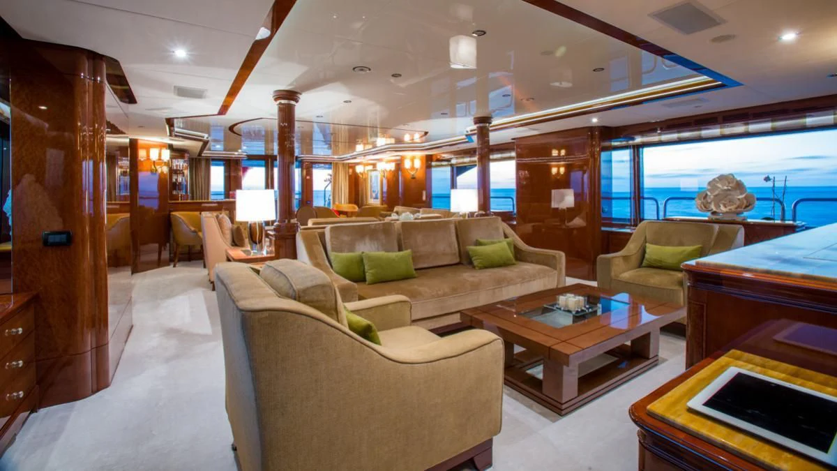 a room with a couch and a table aboard CHECKMATE Yacht for Charter