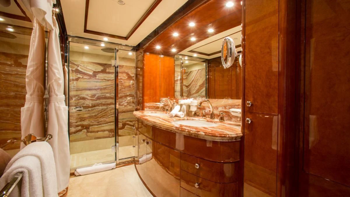 a bathroom with a large mirror aboard CHECKMATE Yacht for Charter