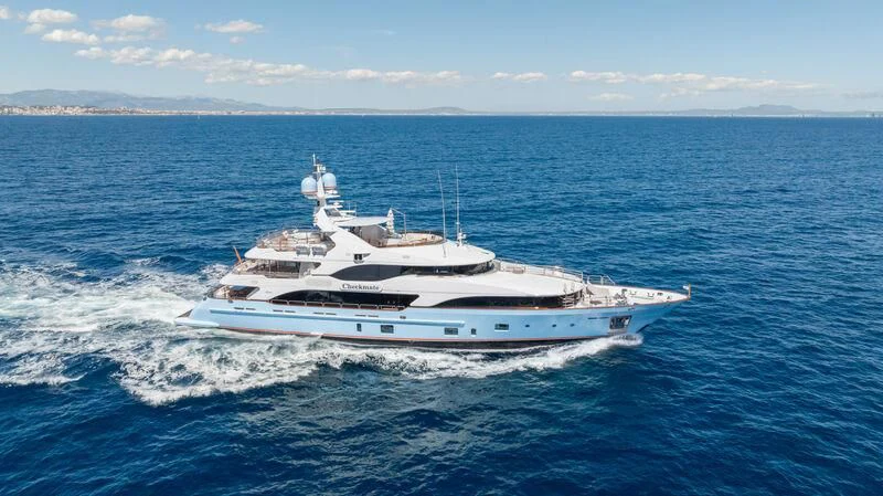 a white boat in the water aboard CHECKMATE Yacht for Charter