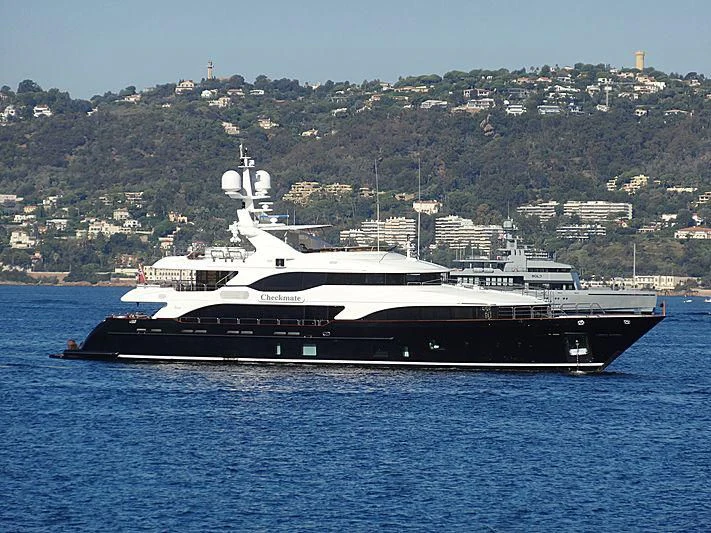 a large ship in the water aboard CHECKMATE Yacht for Charter