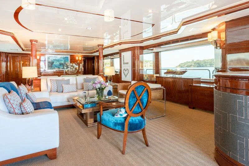 a living room with a large window aboard CHECKMATE Yacht for Charter