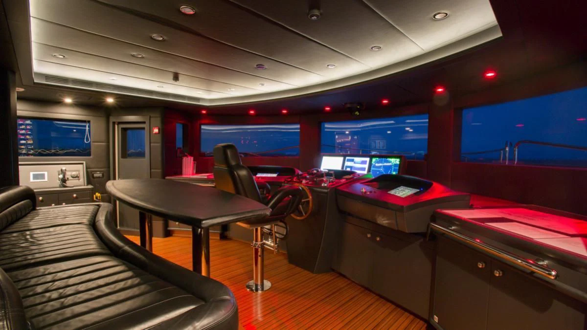 a room with a table and chairs aboard CHECKMATE Yacht for Charter