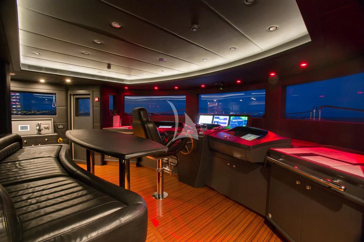 a room with a table and chairs aboard CHECKMATE Yacht for Charter