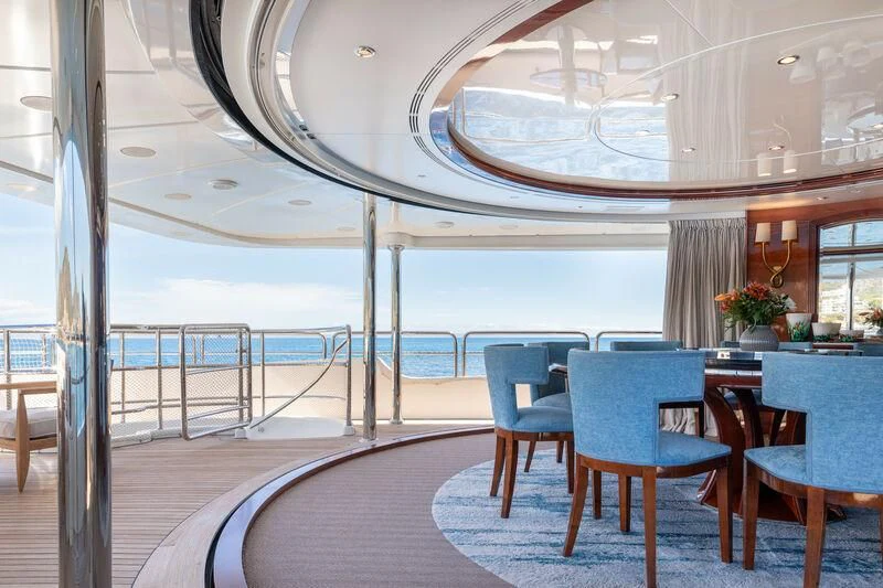 a large room with a balcony aboard CHECKMATE Yacht for Charter