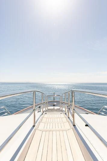 a wooden walkway over water aboard CHECKMATE Yacht for Charter