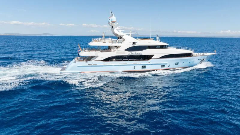 a white yacht in the ocean aboard CHECKMATE Yacht for Charter