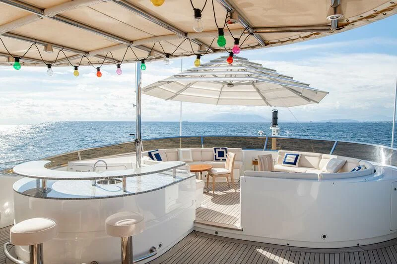 a table and chairs on a boat aboard CHECKMATE Yacht for Charter