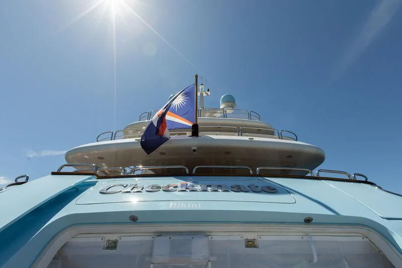 a boat with flags on it aboard CHECKMATE Yacht for Charter