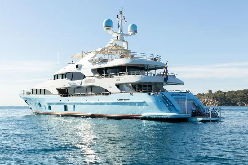 a large white boat on the water aboard CHECKMATE Yacht for Charter