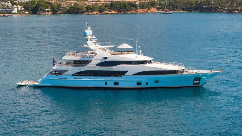 a large white yacht on the water aboard CHECKMATE Yacht for Charter