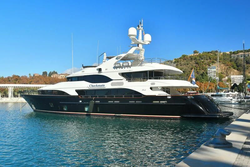a large boat in the water aboard CHECKMATE Yacht for Charter