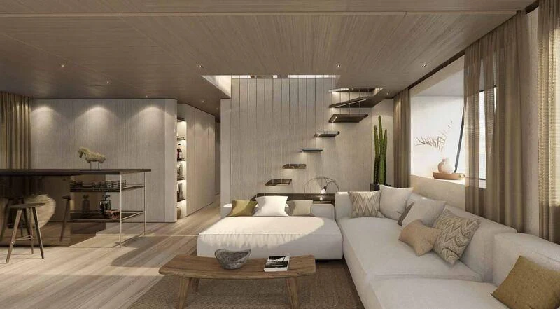 a room with a couch and a table aboard SANLORENZO SX100/119 Yacht for Sale