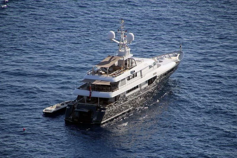 a large ship in the water aboard MARIU Yacht for Sale