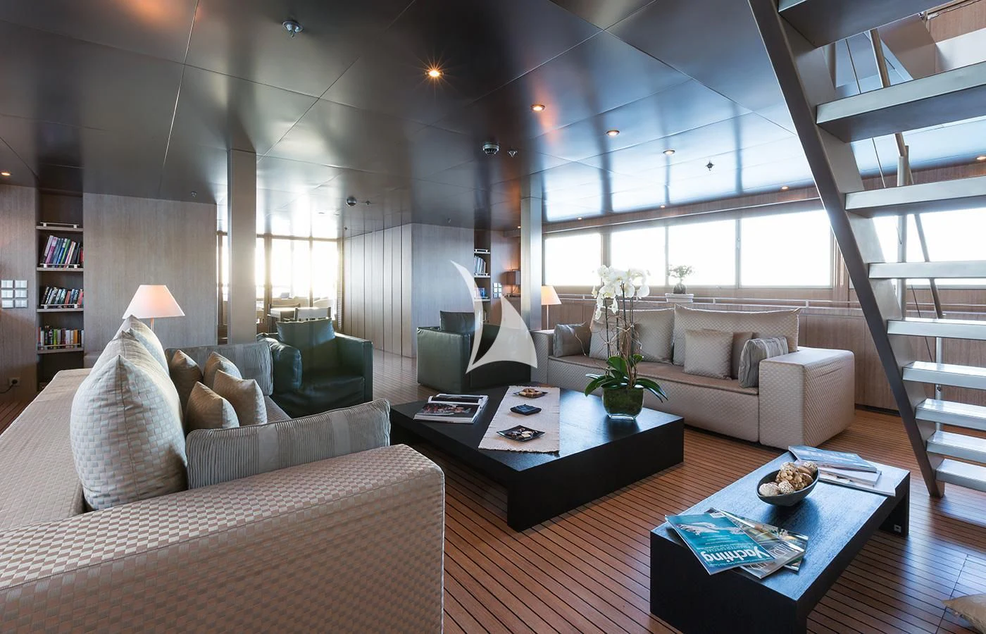 a living room with a couch and a coffee table aboard MARIU Yacht for Sale