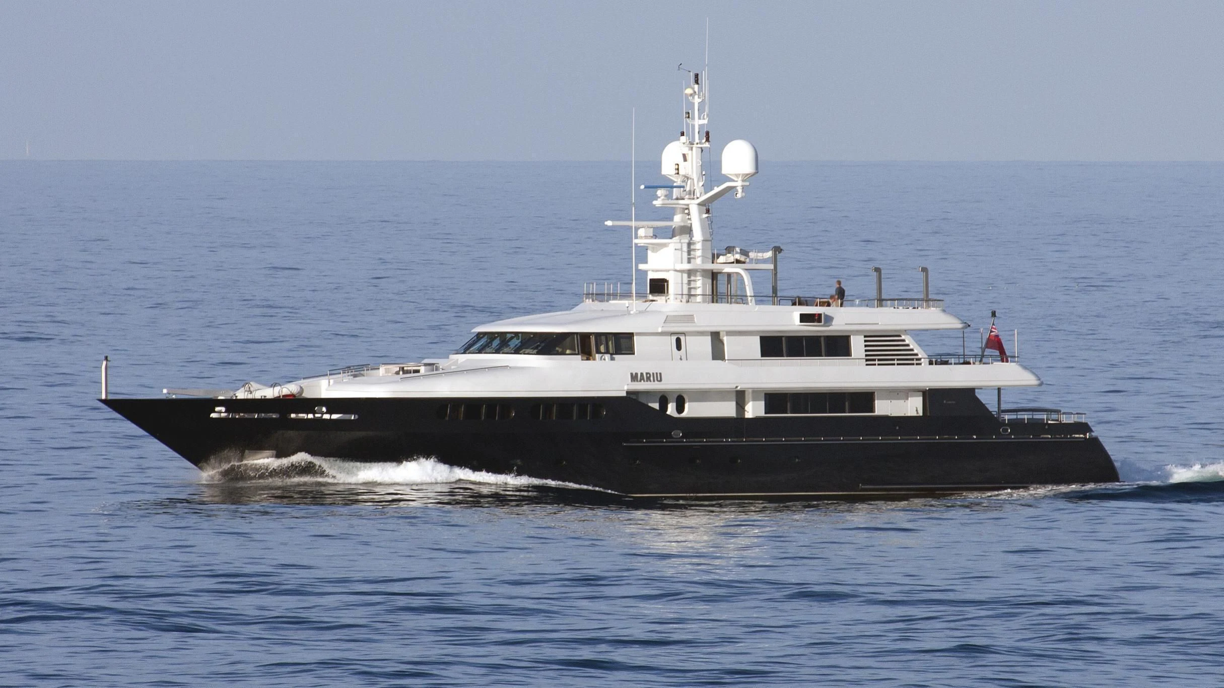 a large ship in the water aboard MARIU Yacht for Sale